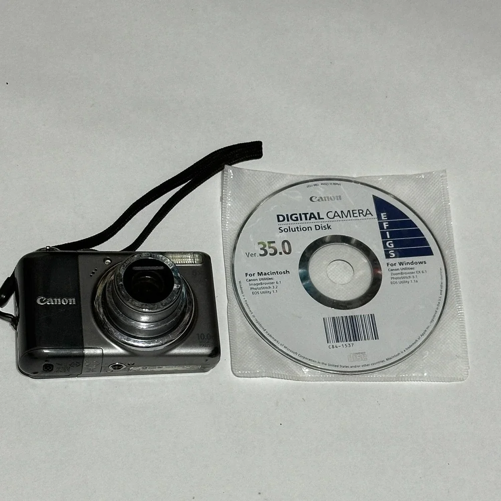 Canon PowerShot A2000 IS 10MP Digital Camera Pink For Parts Or Repair Lens Error